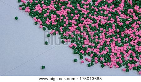 Polymeric dye. Plastic pellets. Colorant for plastics. Pigment in the granules.  Polymer beads