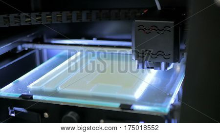 Three dimensional printing machine. 3D printer during work