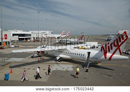SYDNEY - APRIL 3: Aircrafts of the Virgin Australia fleet at Sydney Domestic Airport April 3th, 2014. Virgin Australia is Australia's second largest airline.