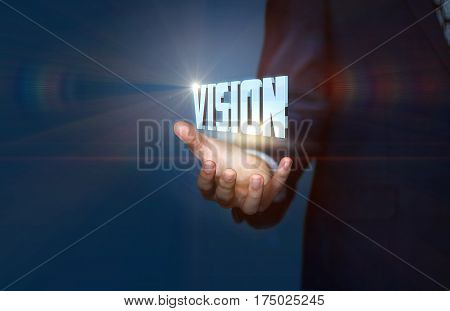 Businessman Demonstrates The Word Vision .