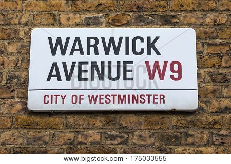 A street sign for Warwick Avenue in West London UK.
