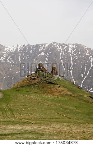 small church in the mountains of caucasus views from giorgia