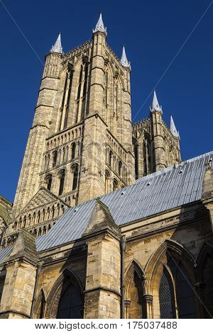 A view of the western towers of Lincoln Cathedral in the historic city of Lincoln UK.