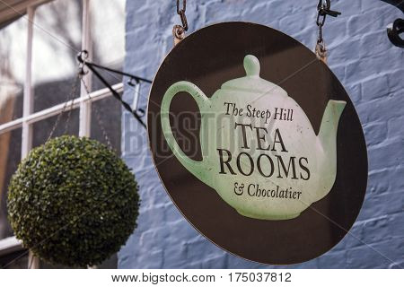 LINCOLN UK - FEBRUARY 28TH 2017: A sign for The Steep Hill Tea Rooms and Chocolatier in the historic city of Lincoln in the UK on 28th February 2017.