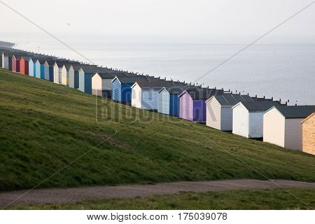 colored beach huts on the beach of Tankerton near Whitstable in Kent, UK