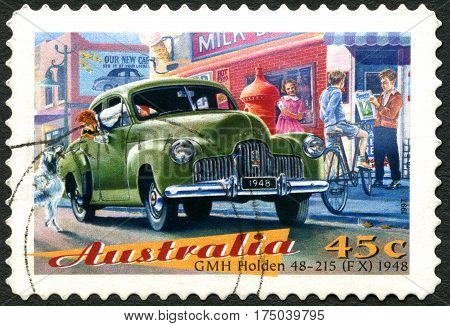 AUSTRALIA - CIRCA 1997: A used postage stamp from Australia depicting an illustration of a GMH Holden 48-215 (FX) 1948 automobile circa 1997.
