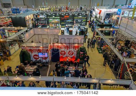 Moscow, Russia - February 25, 2017: Panoramic top view of the exhibition pavilion Hunting and fishing in Russia, VDNKh. Exhibits, participants and visitors of the fair.