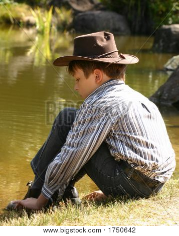 Sidder ved en Billabong