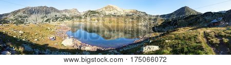 Morning panoramic mountain view from romanian Carpathian mountains Bucura lake and Retezat mountains Romania