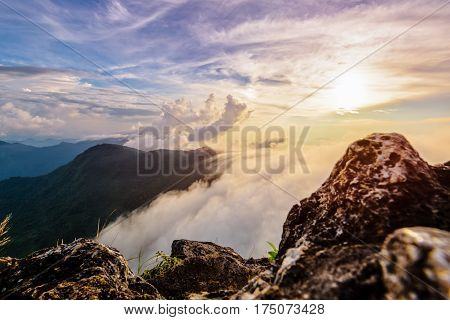 Beautiful landscape nature of high mountain colourful sunlight cloud and sky on Phi Pan Nam Range during sunset in winter from viewpoint Phu Chi Fa Forest Park at Chiang Rai Province Thailand