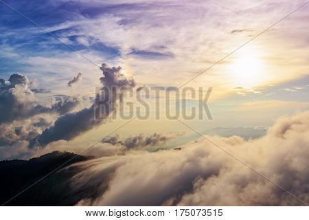 Beautiful landscape nature of high mountain colourful sunlight cloud and sky on Phi Pan Nam Range during sunset in winter from viewpoint Phu Chi Fa Forest Park at Chiang Rai Province Thailand