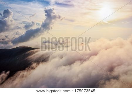 Beautiful landscape nature of high mountain colourful sunlight cloud and sky on Phi Pan Nam Range during sunset in winter from viewpoint Phu Chi Fa Forest Park at Chiang Rai Province Thailand