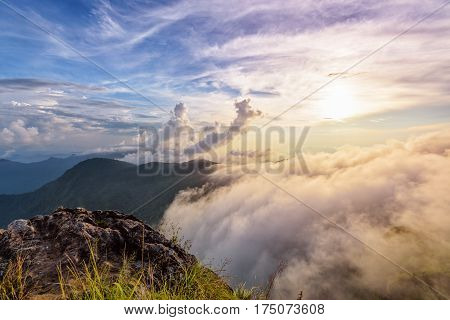 Beautiful landscape nature of high mountain colourful sunlight cloud and sky on Phi Pan Nam Range during sunset in winter from viewpoint Phu Chi Fa Forest Park at Chiang Rai Province Thailand