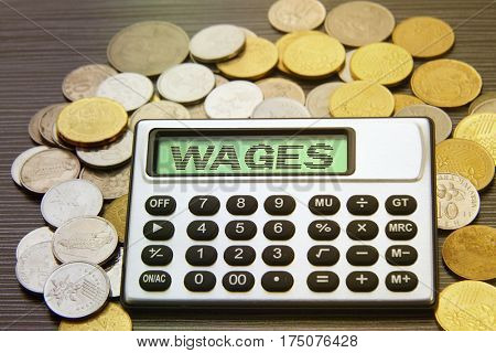 coins and silver calculator with text on display-wages