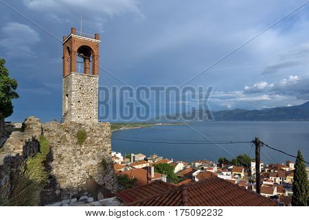 Sunset view of Clock tower in Nafpaktos town, Western Greece