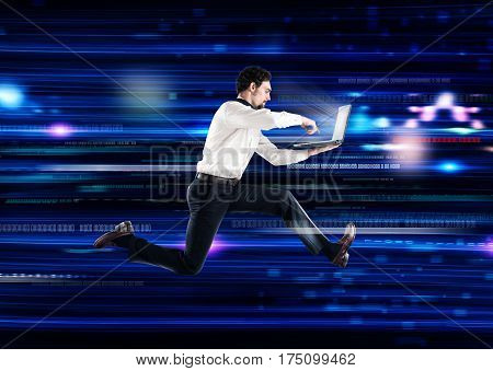Futuristic technology background with a businessman who runs with laptop. Global internet connection and streaming concept