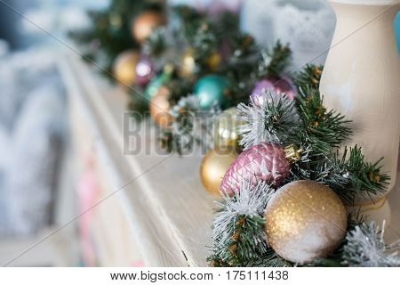 Christmas toys on a Christmas tree under snow