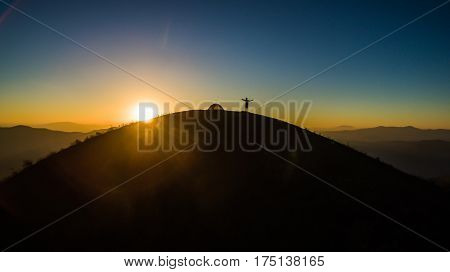 Alone mountain stand in the mountain on sunset moment
