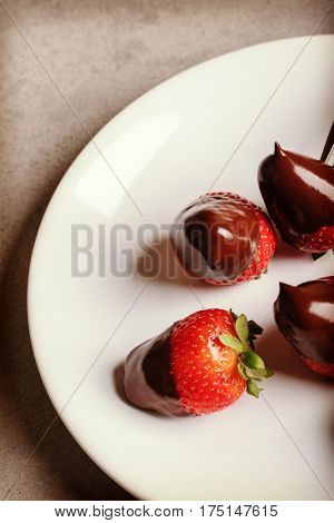 Juicy strawberry with milk chocolate