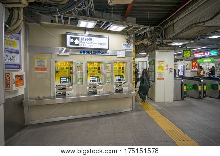 Tokyo, Japan - 17 February 2017: Automated train ticket machine at Suidobashi station terminal. Train ticket can be bought at train station using the automated ticket machine.