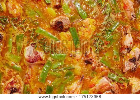 Paella from Spain recipe process boiling broth step by step