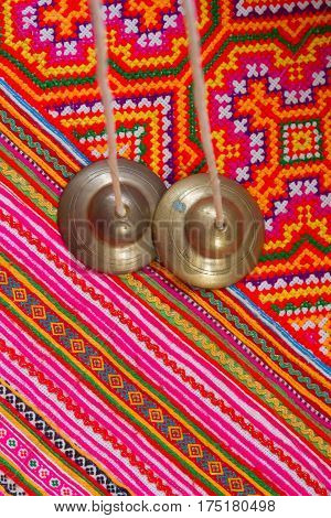 tibetan bell tingsha on handmade fabric  .