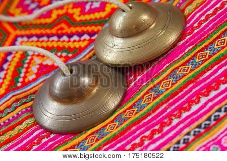 tibetan bell tingsha on handmade fabric  .