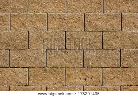 brick wall from rough light brown colored brick