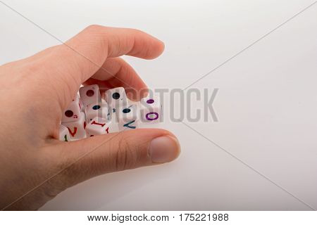 Colorful Alphabet Letter Cubes In Hand