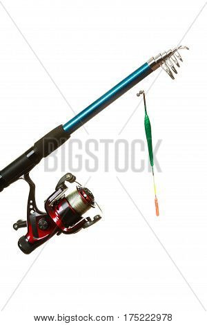 Spinning sport equipment concept. Person holding fishing rod with float and waggler with line.