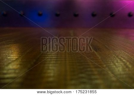 Wooden Floor And Iron Wall With Rivet Background