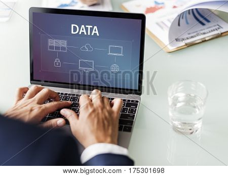 Hands working on laptop network connection graphic overlay