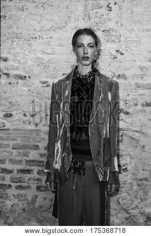 MILAN ITALY - FEBRUARY 25: Gorgeous model poses in the backstage just before Cividini show during Milan Women's Fashion Week on FEBRUARY 25 2017 in Milan.