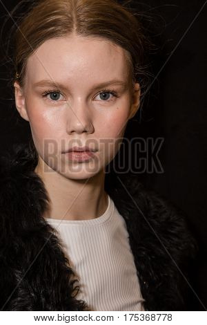 MILAN ITALY - FEBRUARY 25: Gorgeous model poses in the backstage just before Cividini show during Milan Women's Fashion Week on FEBRUARY 25 2017 in Milan.