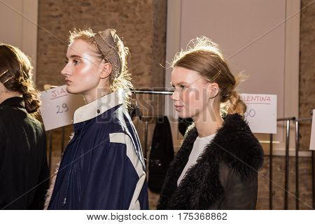 MILAN ITALY - FEBRUARY 25: Gorgeous models pose in the backstage just before Cividini show during Milan Women's Fashion Week on FEBRUARY 25 2017 in Milan.