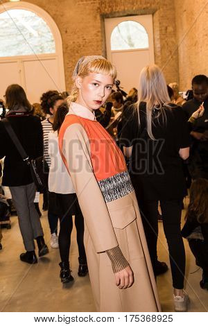 MILAN ITALY - FEBRUARY 25: Gorgeous model poses in the backstage just before Cividini show during Milan Women's Fashion Week on FEBRUARY 25 2017 in Milan.