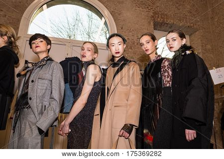 MILAN ITALY - FEBRUARY 25: Gorgeous models pose in the backstage just before Cividini show during Milan Women's Fashion Week on FEBRUARY 25 2017 in Milan.