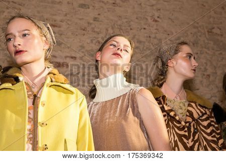 MILAN ITALY - FEBRUARY 25: Gorgeous models pose in the backstage just before Cividini show during Milan Women's Fashion Week on FEBRUARY 25 2017 in Milan.