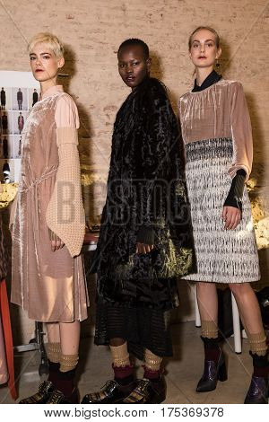 MILAN ITALY - FEBRUARY 25: Gorgeous models pose in the backstage just before Cividini show during Milan Women's Fashion Week on FEBRUARY 25 2017 in Milan.