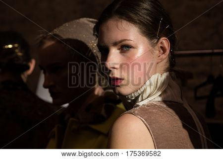 MILAN ITALY - FEBRUARY 25: Gorgeous model poses in the backstage just before Cividini show during Milan Women's Fashion Week on FEBRUARY 25 2017 in Milan.