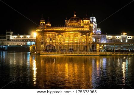 Nightly view of Golden Temple - Sikhs holy place in Amritsar - India