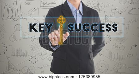 Businessman hand pressing wording key to success. sign on virtual screen. can used for cover page presentation and web banner. business strategic concept.
