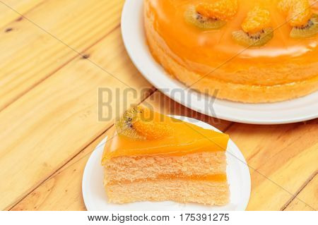 Orange cake on the wooden desk,homemade barkery