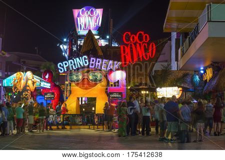 CANCUN MEXICO - FEBRUARY 28 2017: Tourists stand in long lines to enter the popular Conco Bongo nightclub in Cancun at the start of Spring Break
