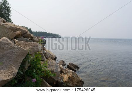 Rocky coast of the lake Uvildy. Russia Summer South Ural