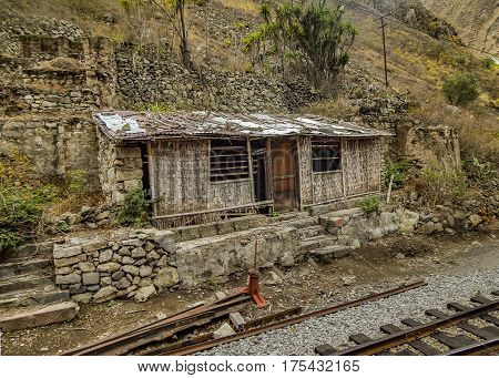 Abandonde house at railroad in Alausi town Ecuador