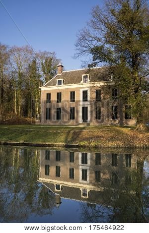 The manorial estate Oud-Amelisweerd on the banks of the river Kromme Rijn near Bunnik