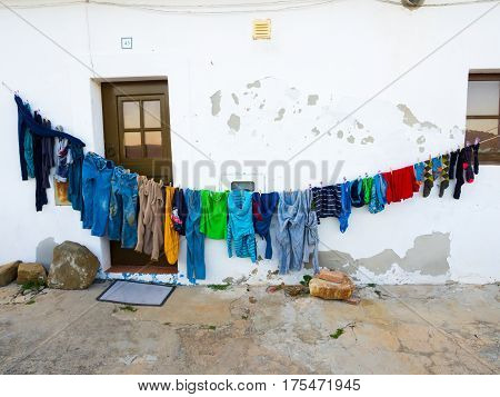 MERTOLA PORTUGAL - MARCH 02 2017: Laundry drying in front of one of the houses in Mertola Alentejo region Portugal.