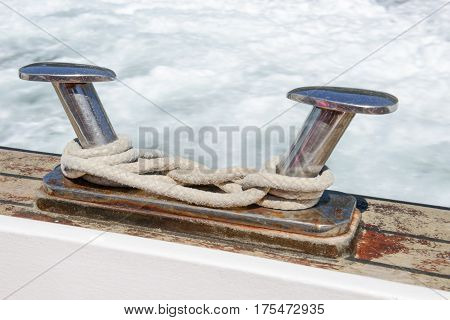 Bitt detail of a boat on the sea
