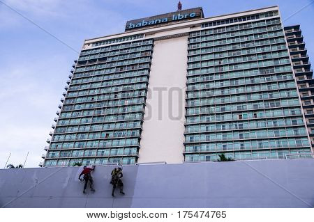 Havana, Cuba on December 22, 2015: Repainting Habana Libre Hotel in the modern neighborhood of El Vedado in Havana, Cuba